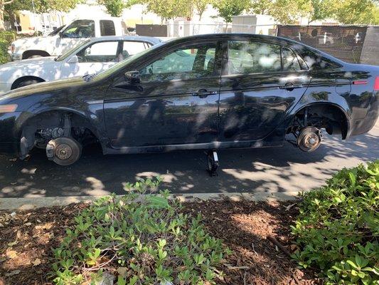 My vehicle after being jacked  and left on a jack on a 100 degree day!