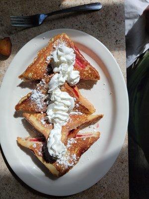 Strawberry stuffed french toast.