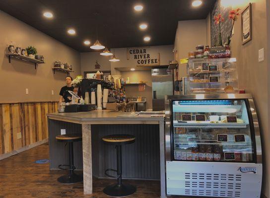 Coffee counter, more seating by windows