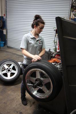 Service writer Nicole, is often found working on her car, an early 90s 240SX. She loves rear wheel drive sports cars.