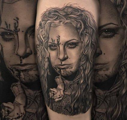 Realistic black and grey portrait of Sheri Moon from House of 1000 Corpses tattoo by Chris Burke at Ghost Light Tattoo Parlor in Milwaukee,