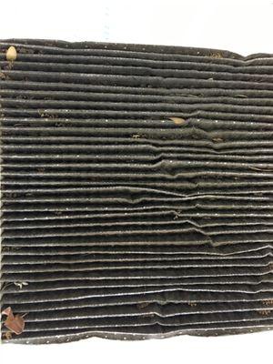 This is the cabin filter that is inside the vehicle that filters the air conditioning air. Like a house one, it needs to be changed!