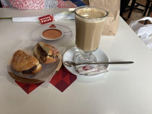 Bola de Berlim with chocolate and a galão