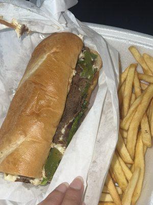 Philly cheesesteak and fries