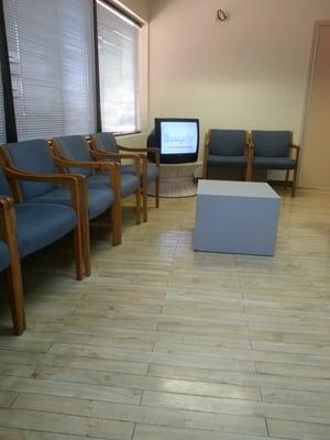 Mini plasma tv in one of the waiting rooms.