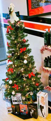 Christmas tree with gifts for every man's grooming;