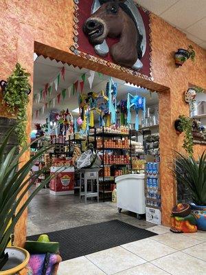 A quick view of the store from the restaurant. They have piñatas!