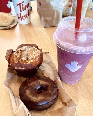 Mixed berry smoothie, blueberry muffin, double chocolate donut.