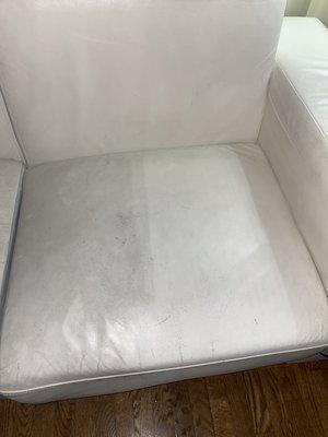 Steaming years of dirt off of this white leather couch... can you see the difference?