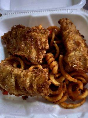 Fish 'n chips, curly fries, coke slaw and tarter sauce.