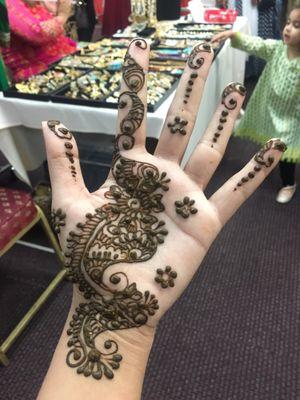 Henna by Tina. She's super nice but designs could be WAY better.