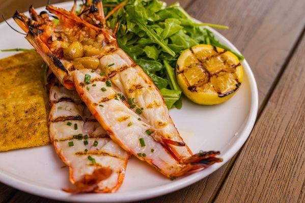 Wood Fired Jumbo Prawn with an Arugula Salad and Old Bay Saltines