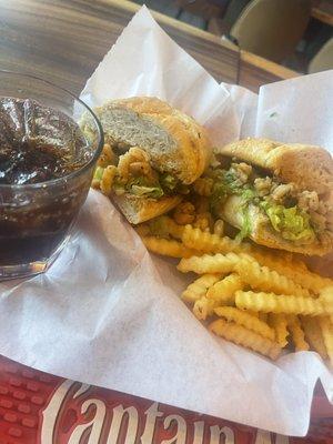 Mouthwatering shrimp Po Boy sandwich with a basket of fries $12.00