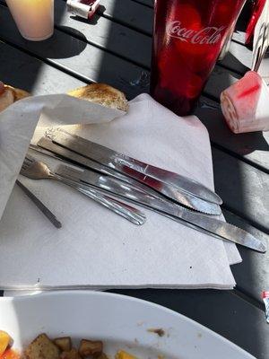 Utensils placed wet not dried.