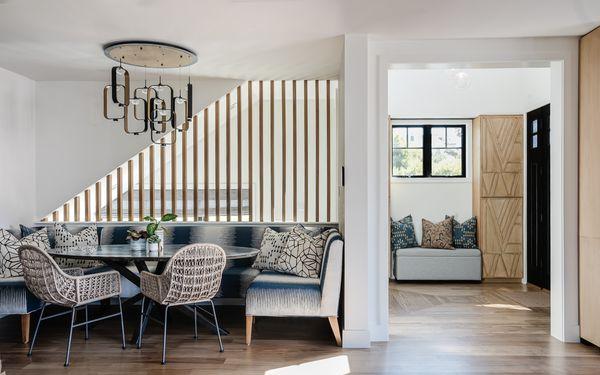 Full home remodel project featuring a custom dining banquette, slat wall detail, custom entry cabinetry, and fabulous lighting throughout.