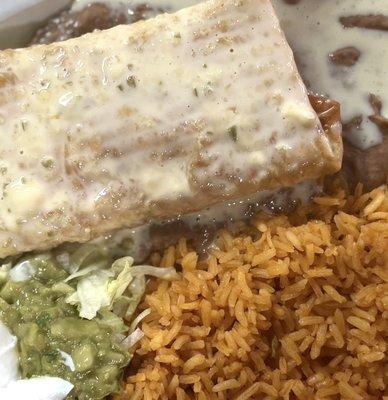 Enchilada , guacamole, rice, sour cream, cheese, Refried Beans