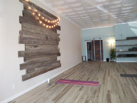 I love the beautiful, neutral tones - the space is so calming, the wood barn door is so cool, and the vibe is so peaceful!