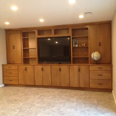 Remodeled basement to a beautiful new family room.  Added a dry bar and shower.  New drywall, cabinets, electrical etc.  Happy Customer!