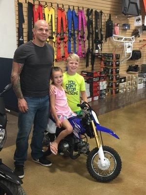 Happy kids with their new Yamaha TTR-50!