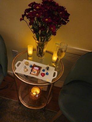 Champagne and chocolates set up after treatment