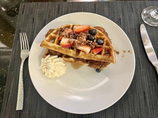 Chicken & waffle with pecan syrup and sweet cream... and fruit.