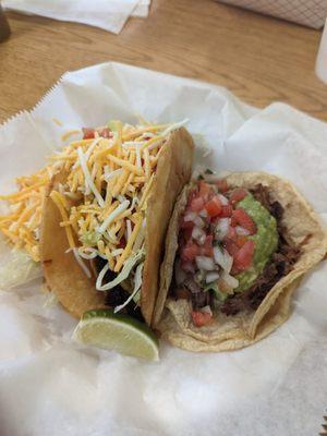 crispy beef taco and carnitas taco