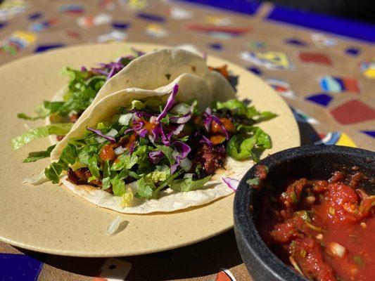 Special pulled pork soft tacos.