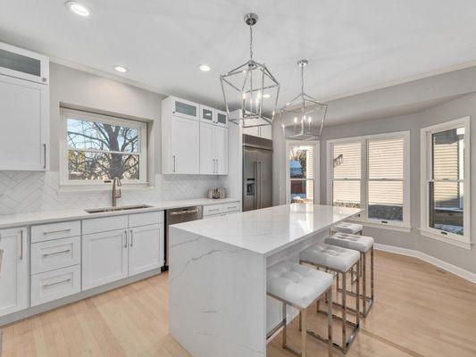 Shaker white with 12" clear glass cabinets on top