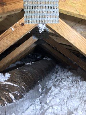 Loose fil fiberglass insulation install saving customers 100's of dollars a year