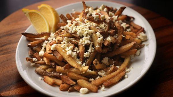 Greek Fries. Topped with feta, lemon, and oregano.