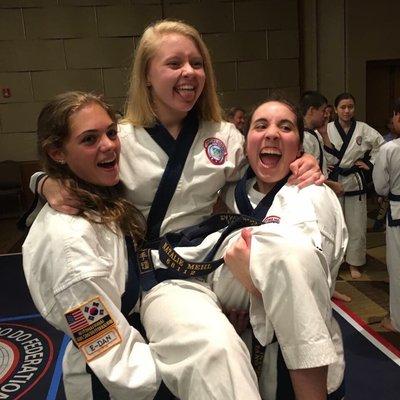 Black Belts celebrating a great tournament victory