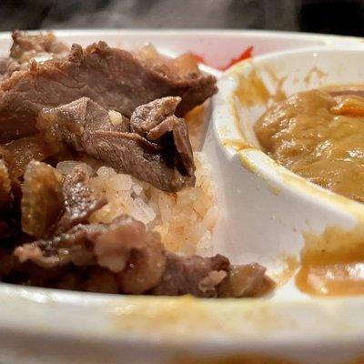 Beef curry over rice. $8.99 + tax + tip