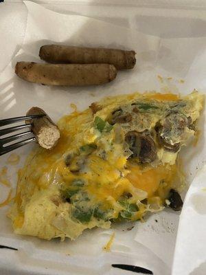 Breakfast omelet with sausage on side