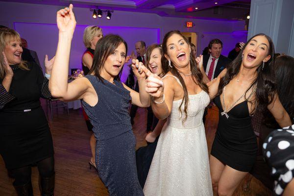 Happy Bride and guests at NYC wedding with DJ Dave Swirsky from Expressway Music.