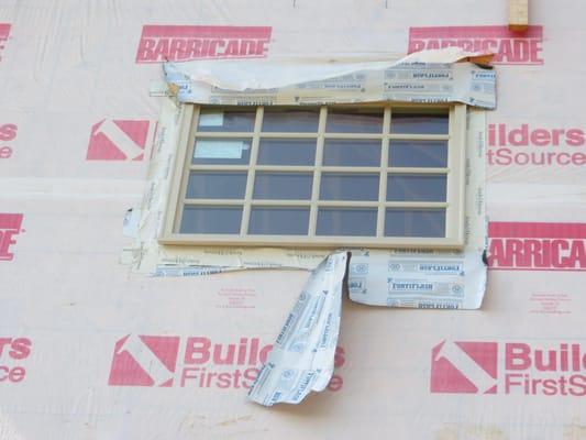 Inspection of proper window installation including weather stripping, flashing, drainage plane, etc. during a pre-drywall pha...