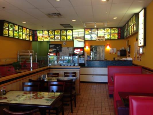 A ten table restaurant in a strip-mall.