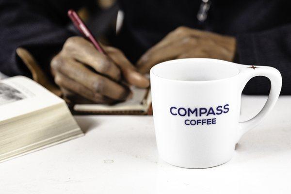 Studying with a Cup of Compass Coffee in Limited Edition Coffee Mug