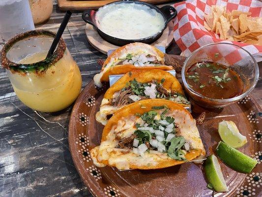 Azteca margarita, birria tacos, Queso Fundido