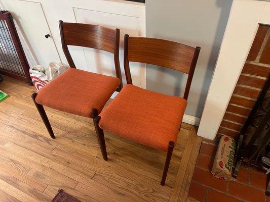 Two chairs with new upholstery for our dining set!