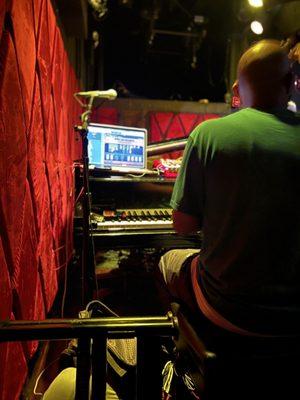 The piano is craned down when the band needs it