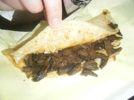 Quesadilla with mushrooms and cheese