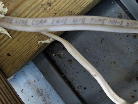 Photo of the incorrect type of wiring used for ceiling fans.