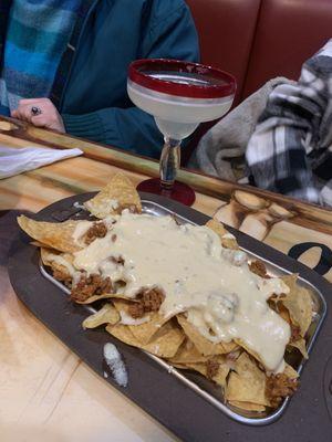 My wife's meal, smothered in cheese (queso)