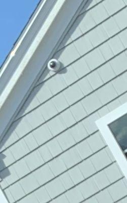 Surveillance cameras on their building