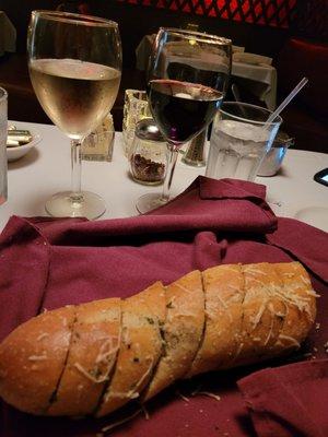 Garlic bread and wine.