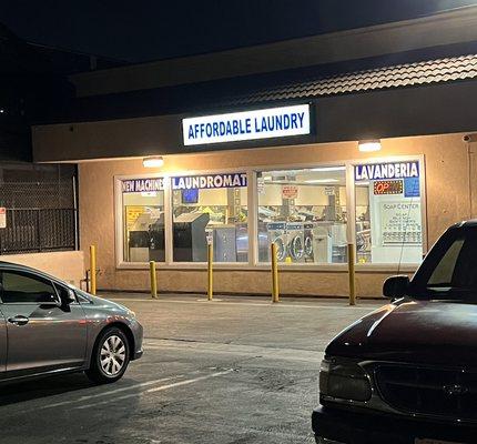 Front of laundromat at night