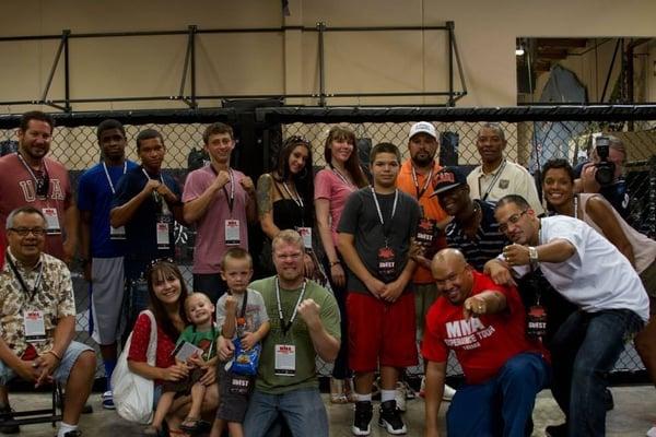 MMA Experience Tour goers group photo.