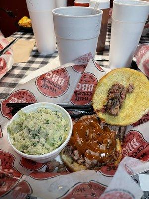 Small smoked brisket sandwich and coleslaw