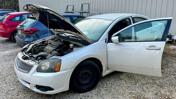 We were not able to program a key and pho to this car until the battery was charged fully