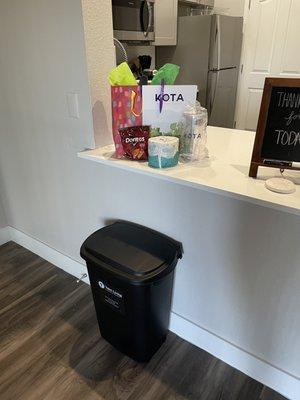 Trash can with goodie bag of necessities...very nice touch.